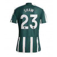Camisa de Futebol Manchester United Luke Shaw #23 Equipamento Secundário 2023-24 Manga Curta